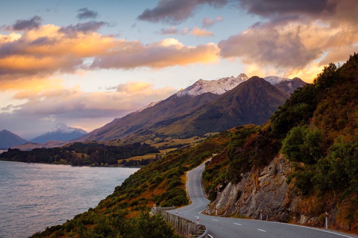 New Zealand mountain road at sunset